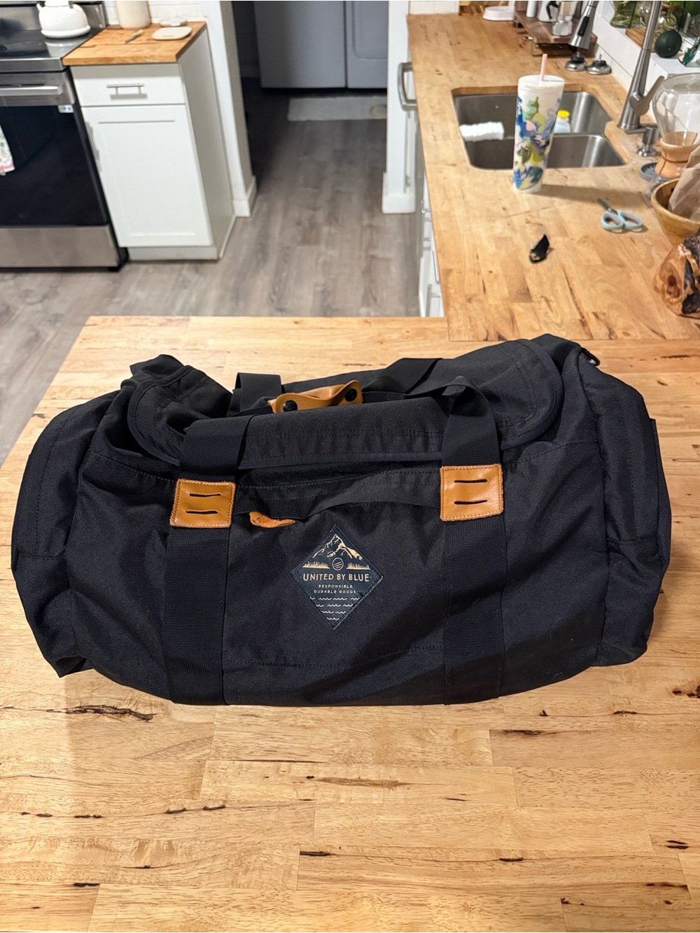 United By Blue Black Duffel with Brown Leather Accents 50L